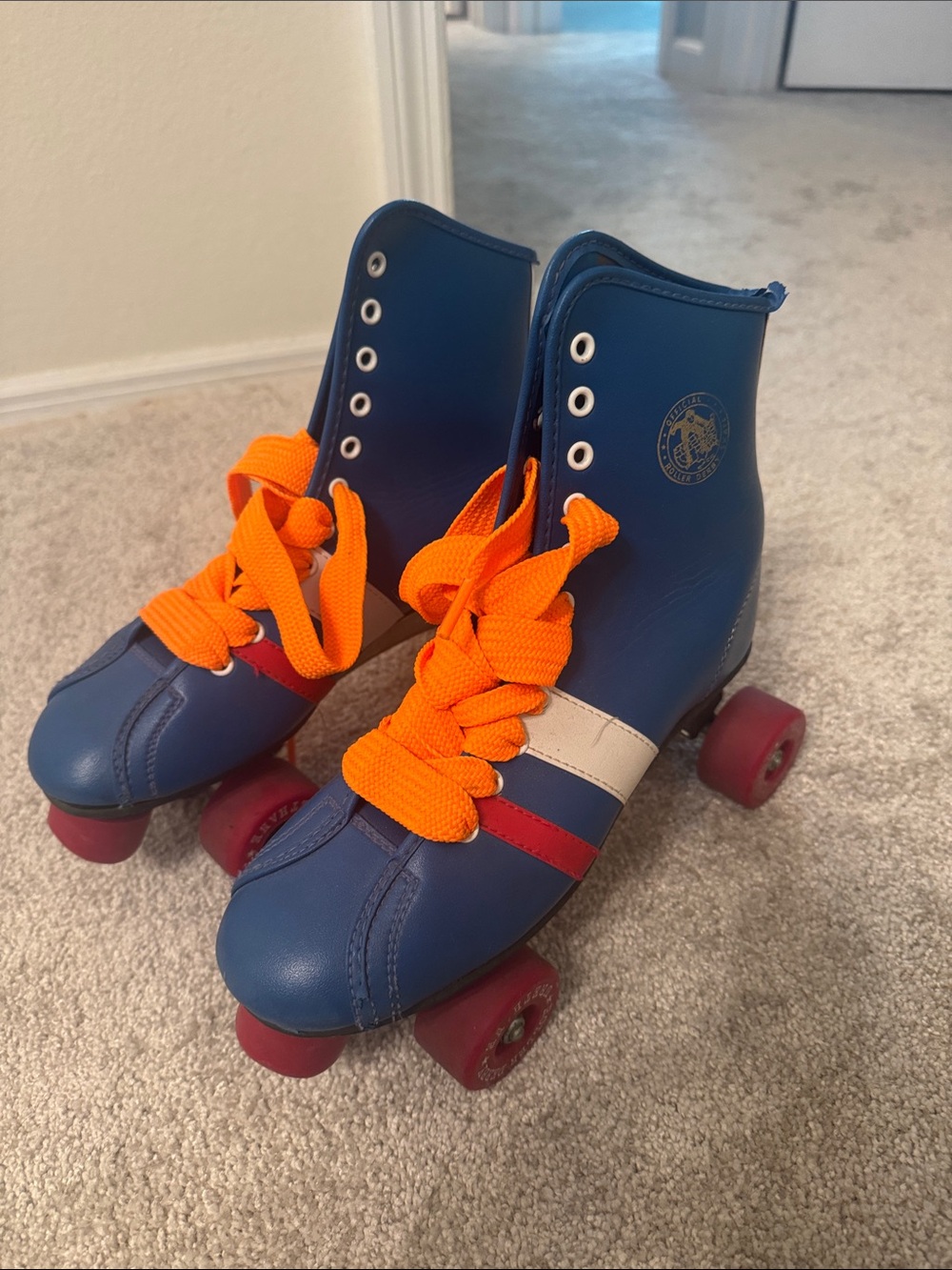Vintage Derby Roller Skates with Orange Laces